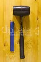Chisel and black rubber hammer