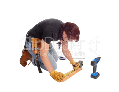 Woman working with tools.