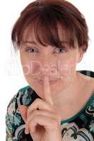 Lovely woman holding finger over mouth.