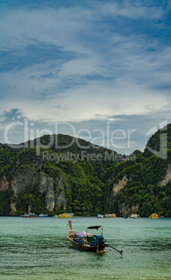 Traditional Thai Longtail boats vs speed boats