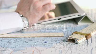 Businessman working on electronic tablet