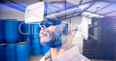 Composite image of close up of businessman holding virtual glass