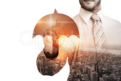 Composite image of businessman in shirt pointing with his finger