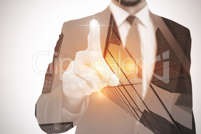 Businessman pointing his finger at camera