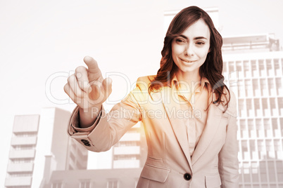 Composite image of portrait of businesswoman touching invisible