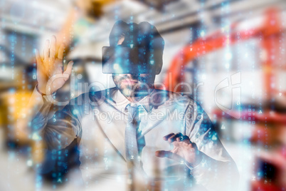 Composite image of businessman with virtual reality glasses at d