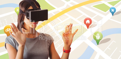 Composite image of businesswoman holding virtual glasses on a wh