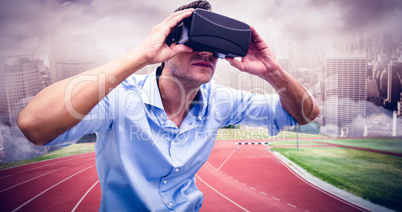 Composite image of man using a virtual reality device