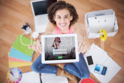 Composite image of login screen with redheaded woman and laptop