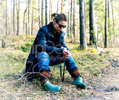 Horizontal vintage russian girl listening player in woods backgr