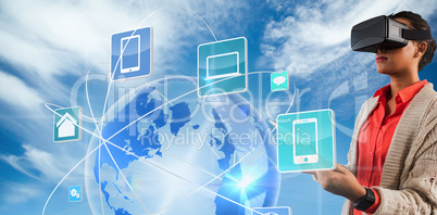 Composite image of teacher holding virtual glasses and tablet co