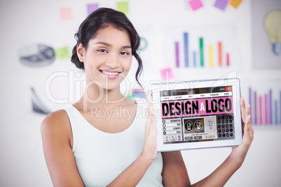 Composite image of happy businesswoman showing digital tablet in