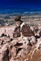 Vertical vibrant Turkey rock sculptures mountain background