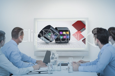 Composite image of business team watching whiteboard during a me