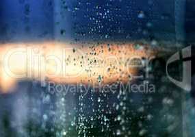 Raindrops on glass abstract background