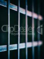 Square vivid prison cell bars closeup deatil bokeh background ba