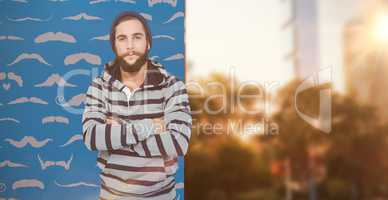 Composite image of portrait of hipster with hooded shirt