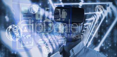 Composite image of portrait of businessman holding virtual glass