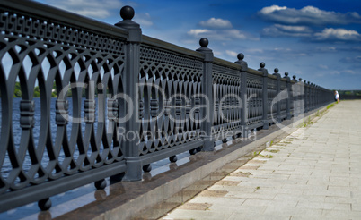 Horizontal vivid fence on a bright day background backdrop