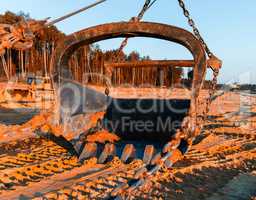 Horizontal vivid sand mining industrial scoop background backdro