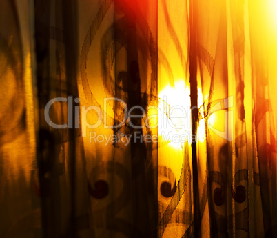 Horizontal vivid sunset curtains with light leak background