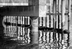 Black and white vibrant Norway quay reflection abstract backgrou