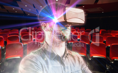 Composite image of man using a virtual reality device