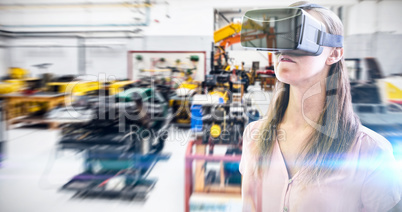 Composite image of woman using an oculus