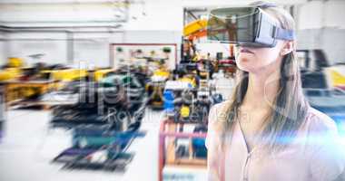 Composite image of woman using an oculus