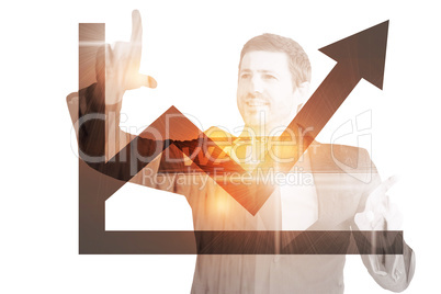 Composite image of happy businessman pointing with fingers