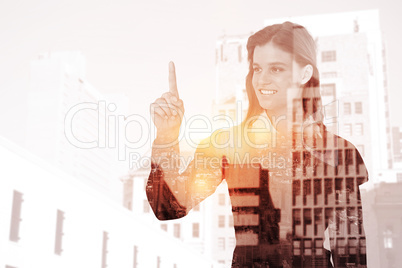 Composite image of smiling woman pointing something with her fin