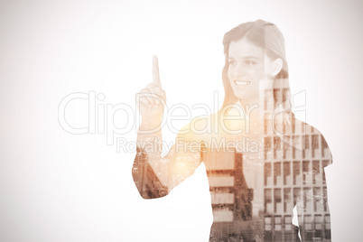 Smiling woman pointing something with her finger