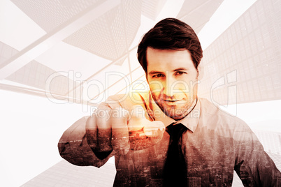 Composite image of portrait of confident businessman pointing at