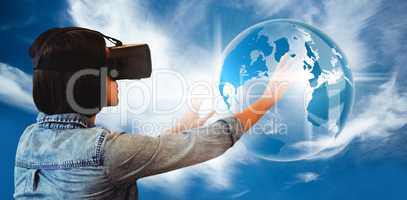 Composite image of side view of businesswoman holding virtual gl