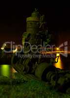 Vertical vintage ship engine on the beach bokeh background backd