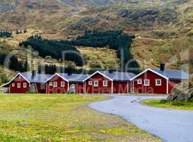 Horizontal vivid Norway campsite cabins nature background backdr