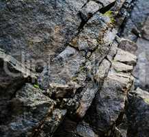 Square vivid rock texture with grass background backdrop