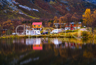 Horzontal vivid autumn Norway camping reflection background back