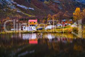 Horzontal vivid autumn Norway camping reflection background back
