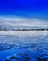 Vertical vivid ice on Finland lake landscape background backdrop