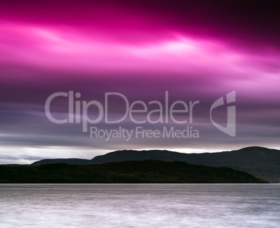 Horizontal vivid pink Norway fjord mountain bay landscape backgr