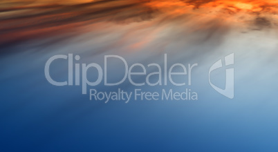 Horizontal vivid sunset altitude cloudscape background backdrop