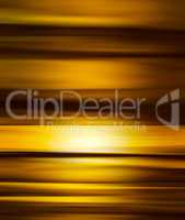 Vertical golden motion blur abstraction backdrop