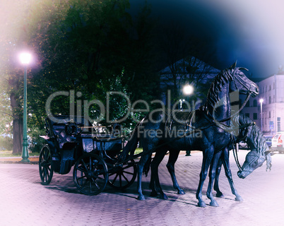 Two horses monument in Minsk Belorussia vignette background back