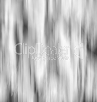 Vertical black and white falling snow in motion abstraction back