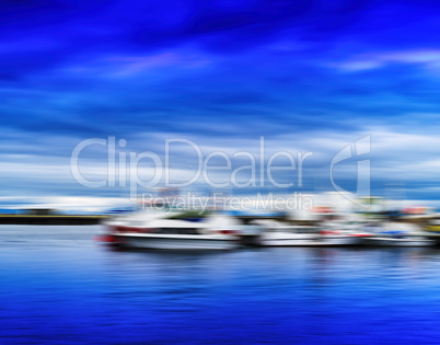 Horizontal blue vivid Norway ships at pier motion blur abstracti