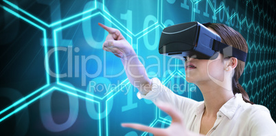 Composite image of woman using a virtual reality device