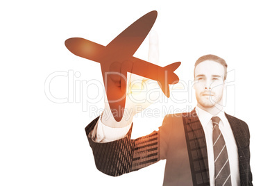 Composite image of unsmiling businessman in suit pointing up his