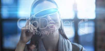 Businesswoman using virtual reality headset