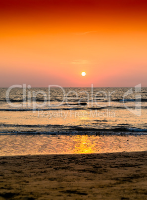 Vertical orange ocean sunset landscape background